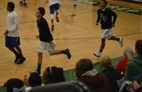 Varsity Players Ailohi Izirein, and Nick Jones enter prepared for their first game